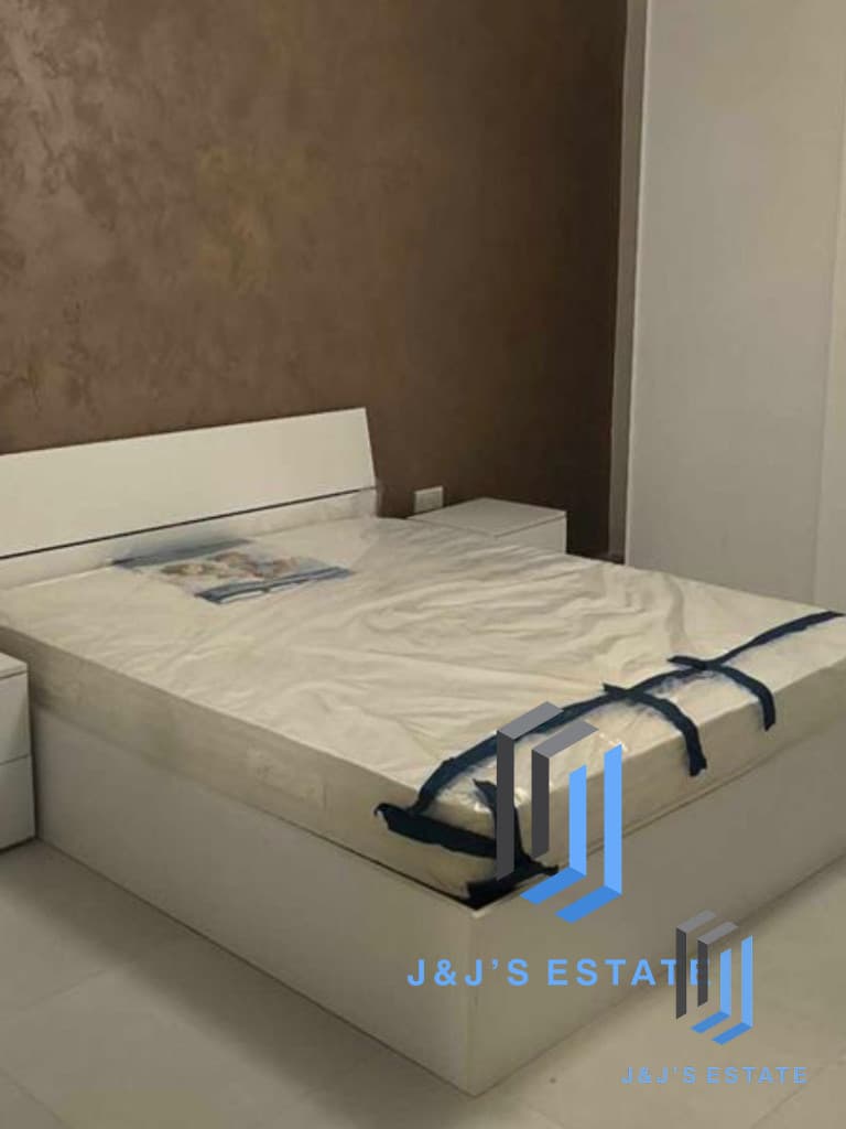 Three-bedroom apartment with balcony in central Attard · 3