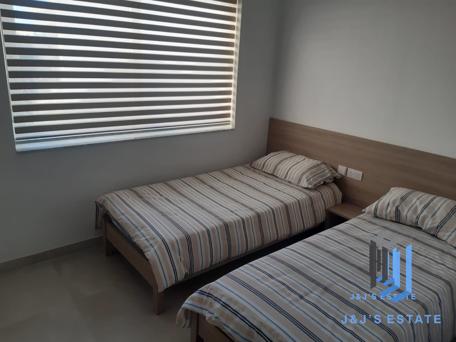 Modern 2-Bedroom Apartment with Office in Lija · 5
