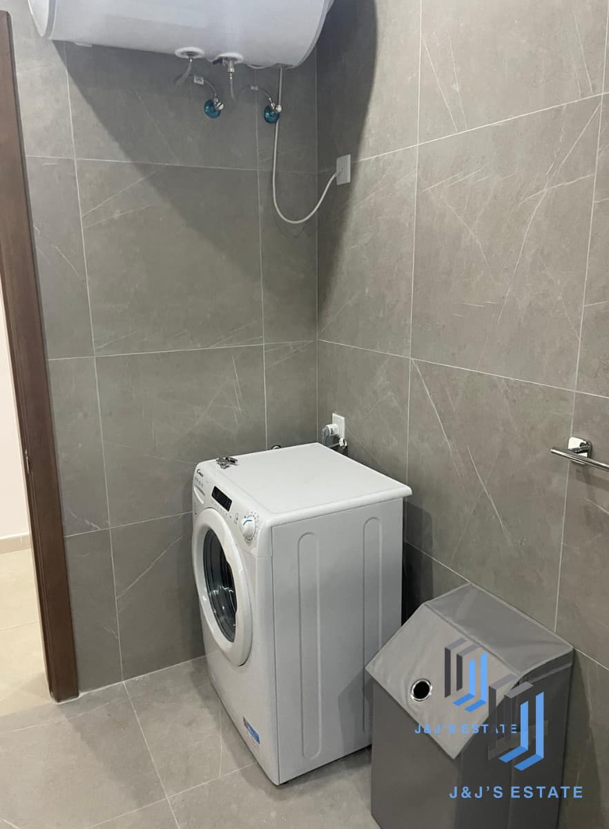 Modern 2-Bedroom Apartment in Qawra · 3