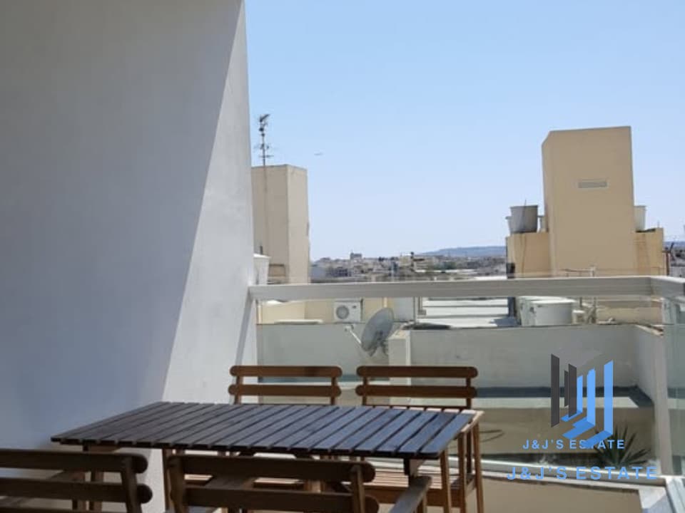 Two-bedroom apartment with terrace in central Msida · 3