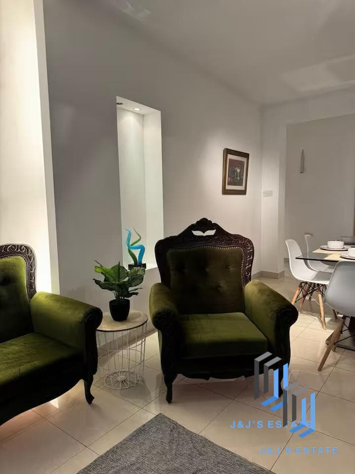 Three-bedroom apartment with balcony and lift in central Sliema · 2