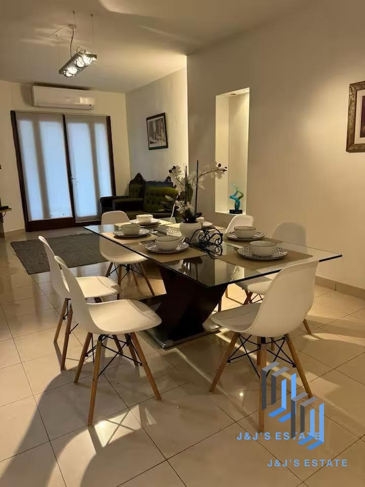 Three-bedroom apartment with balcony and lift in central Sliema · 4