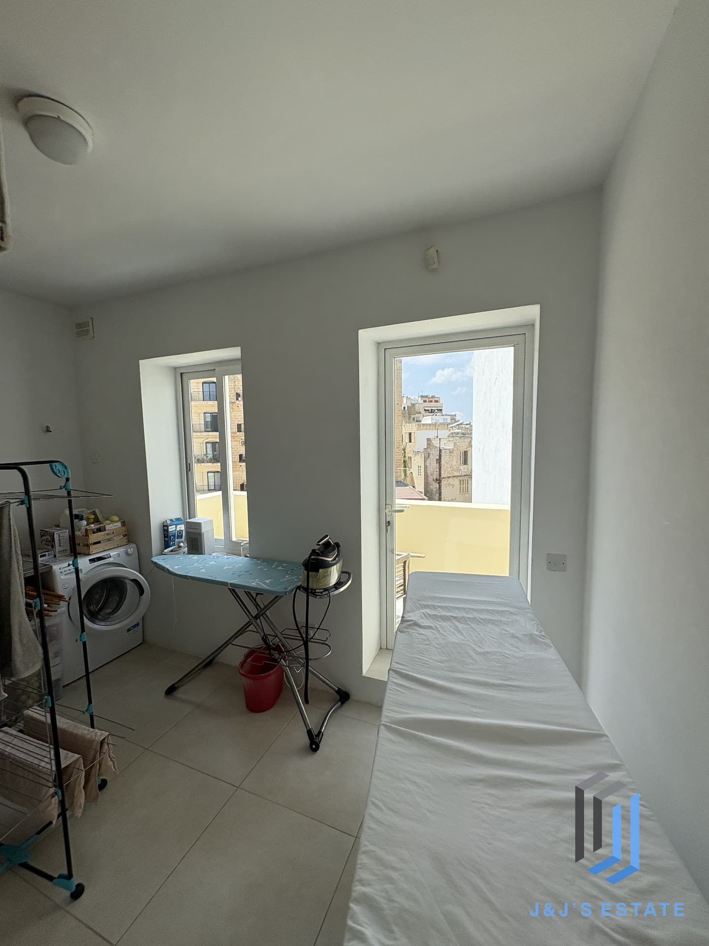 Elegant 4-Bedroom Townhouse with Courtyard and Roof Terrace in Sliema · 25
