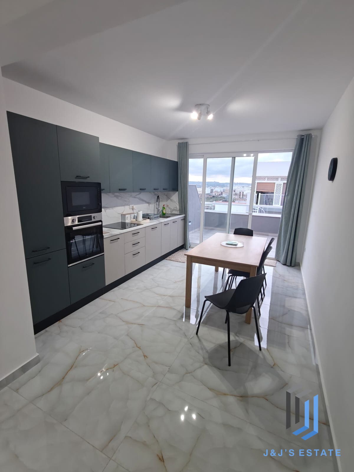 Fully furnished one-bedroom penthouse with city view in Hamrun · 2