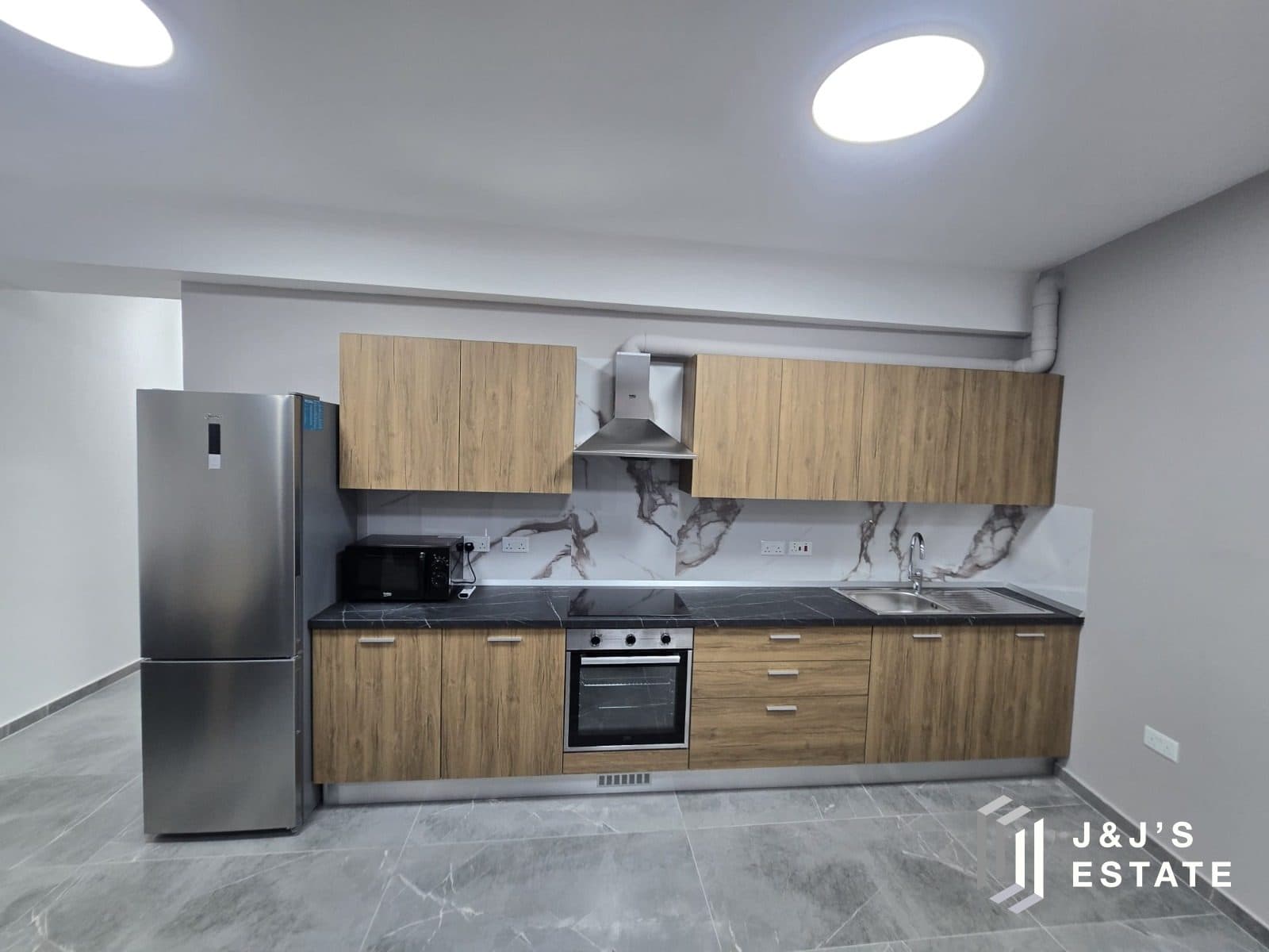 Brand new 3-bedroom maisonette with garage in central Birkirkara · 3
